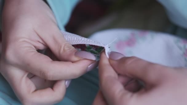 Young Woman Sews Manually Thread Needle Slow Motion Close Female — Video