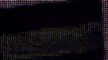 RGB multi-colored LED on the matrix of the TV close-up. Extreme macro view of 4K LED matrix red, blue, and green sub-pixels, monitor, or TV screen. Colored pixels texture creates an abstract pattern.