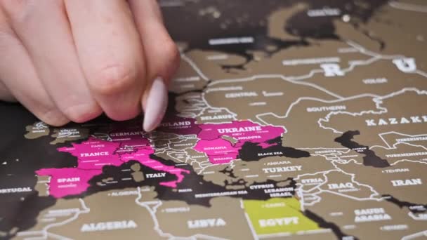 Female Hand Scratching Europe Countries Surface Scratch World Map Scratch — Vídeo de Stock