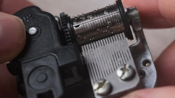 Old Music Box Mechanism Spinning Cylinder Cogs Male Hands Macro — Video