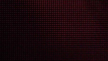 Close-up of the LCD screen pixels. Macro view of a television LED screen. Colored RGB sub-pixels create an abstract pattern. Red, blue, and green LED pixels of the VA matrix of 4K TV. Colorful display