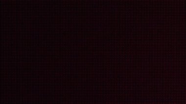 Macro view of a television LED screen with RGB sub-pixels. Colored pixels in close-up create an abstract pattern. Red, blue, and green LCD pixels background of VA matrix of 4K TV. Closeup monitor.