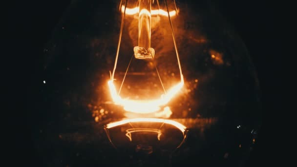 Incandescent Filament Close Glows Flickers Black Background Bulb Turns Warm — Stok video