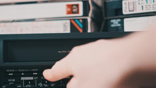 Male Hand Pulls Out Vhs Vintage Videotape Recorder Eject Vhs — 图库视频影像