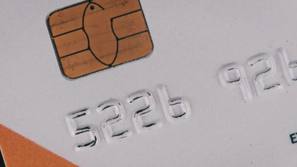 Πλαστική Πιστωτική Κάρτα Περιστρέφεται Κοντά Πλαστική Τραπεζική Κάρτα Γυρίζοντας Μακροεντολή — Αρχείο Βίντεο