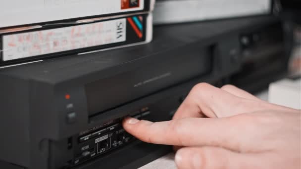 Eject Vhs Tape Cassette Vcr Player Male Hand Pulls Out — Vídeo de stock