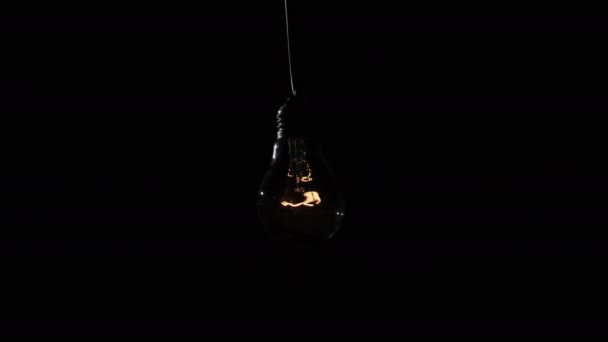 Incandescent Lamp Lights Flickers Black Background Light Bulb Turned Close — Stock Video