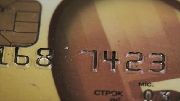 Plastic Credit Card Rotates Close Plastic Bank Card Spinning Macro — Stockvideo