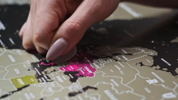 Female Hand Scratching Europe Countries Surface Scratch World Map Scratch — Vídeo de Stock