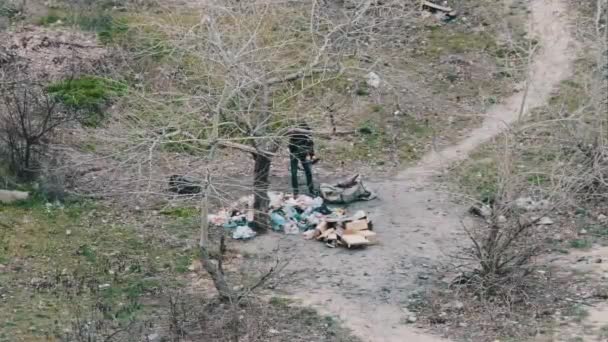 Homeless Man Rummages Garbage Sorting Plastic Bottles Homeless Sort Trash — Stock Video
