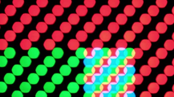 发光Rgb Led灯的多色背景 效果不一 Led面板 许多发光半导体二极管 Led点背景红色 绿色蓝色发光二极管 — 图库视频影像
