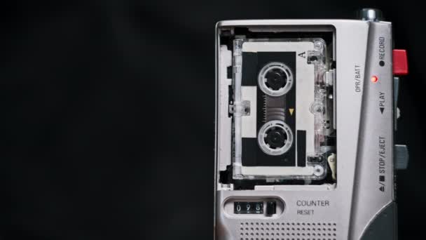 Microcassette Spins Portable Handheld Recorder Black Background Handy Tape Retro — Stock Video
