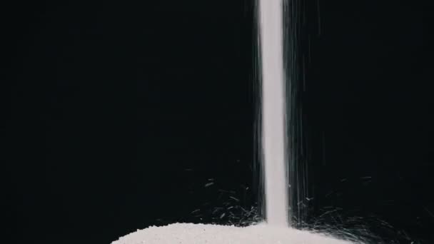 Sugar Pours Stream Black Background Slow Motion Close White Sugar — Stock Video