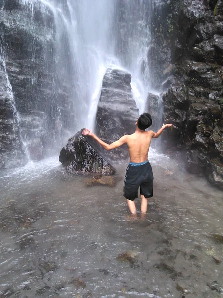 Expression Man Enjoying Cool Fresh Gurgling Waterfall While Vacation Sarangan — Stock Photo, Image