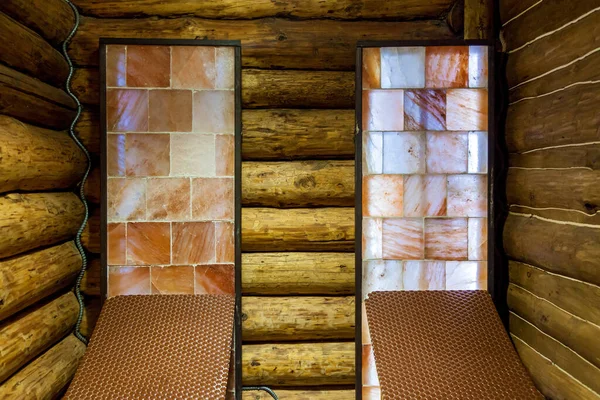 The interior of the salt room in a wooden frame. Rest room in a health center in the Carpathians