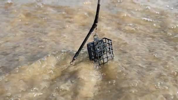 Fishing Tackle Plastic Cage Sandy Shore — Stock Video
