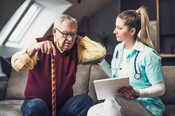 Home Doctor Visiting Senior Man Check His Health Professional Caregiver — Stock Photo, Image