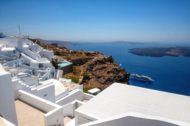 Beautiful white architecture of Santorini island, summer landscape with blue sky, sea and caldera view, outdoor travel background, Imerovigli, Greece