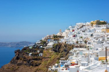 Beautiful white architecture of Santorini island, summer landscape with blue sky, sea and caldera view, outdoor travel background, Imerovigli, Greece