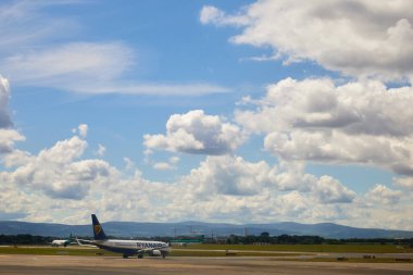 Dublin, airport, Ryanair ready to take off with copy space in a cloudy day