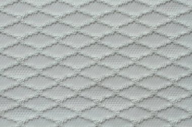 Polyester dantel kumaşın bembeyaz dokusu. Makro. Doku. Yakın çekim.