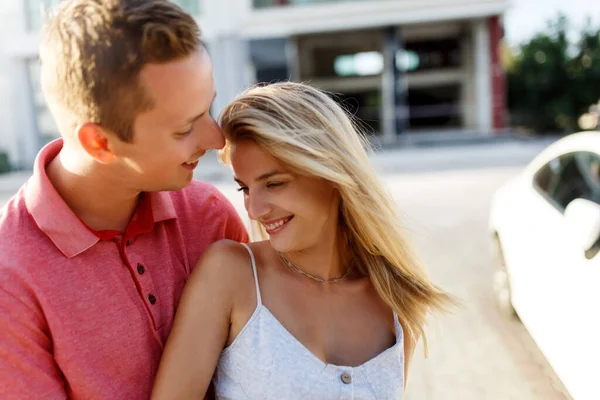 stock image Lovely happy couple.Hugs together and smile in sunset light