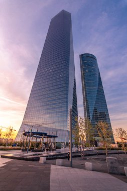 Madrid sunset. The Torre de Cristal is a 249-meter, 50-story skyscraper located in Madrid (Spain), in the Cuatro Torres Business Area complex.