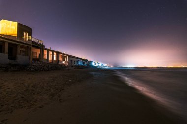 Old fishermen's houses on the beach of Guardamar del Segura, Alicante.