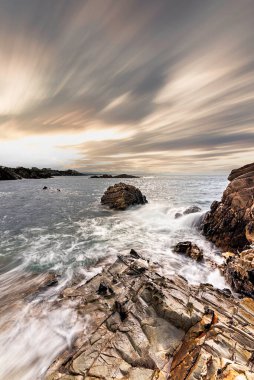 Sunset on the cliffs of Tapia de Casariego, overlooking the fishing port, Asturias, Spain