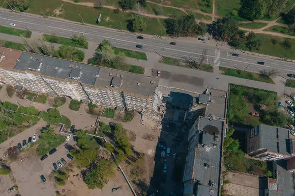 A Russian rocket flew into a residential building in the city of Dnipro, Ukraine. A residential building destroyed by an explosion after a Russian missile attack from above. Scars of war.