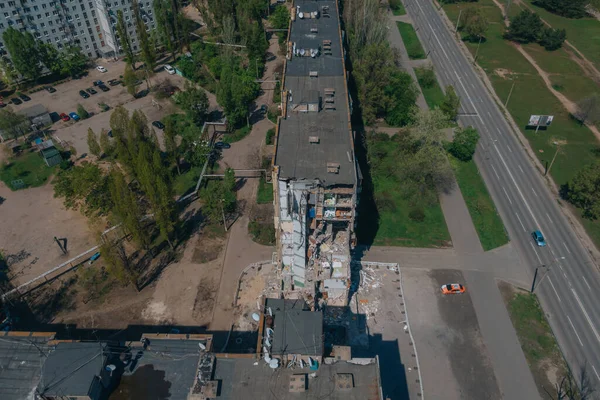 A Russian rocket flew into a residential building in the city of Dnipro, Ukraine. A residential building destroyed by an explosion after a Russian missile attack from above. Scars of war.