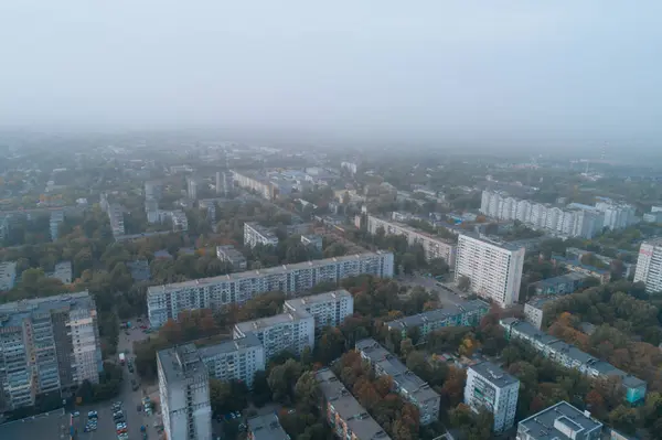 stock image Aerial view of Dnipto city, Ukraine in fog. Cityscape. Panoramic view. Foggy metropolis. Ghost town. Atmospheric shot.