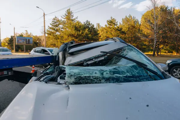 stock image There was a collision of cars on the highway. Serious accident. Road accidents on the road. Broken windshield. The car flew under the trailer of a truck. Traffic jam. Insurance case on the road