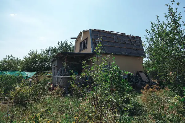 stock image Shelling of civilians. Military aggression. Consequences of the enemy attack on the city of Dnepr. Destroyed residential. Remains of private houses. Consequences of shelling. Russia Ukraine war