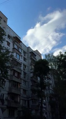 A plan of the faade of an apartment building with severe war damage. Broken and twisted window frames are visible, highlighting the damage to civilian infrastructure.