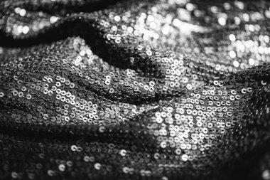 Parlak pullu kumaşın soyut bileşimi. Tatil ve parti konsepti