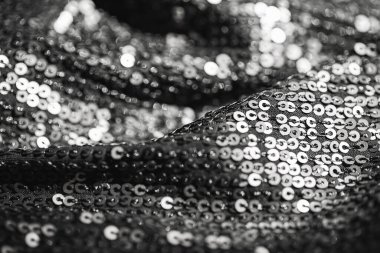 Parlak pullu kumaşın soyut bileşimi. Tatil ve parti konsepti