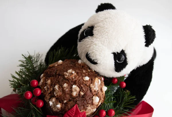 Panda Plush Doll holding Panettone Christmas Cake on white background