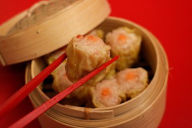 Traditional Chinese Snacks, Su Mai, Stuffed Dumpling on Red Background