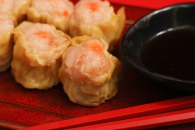 Traditional Chinese Snacks, Su Mai, Stuffed Dumpling on Red Background