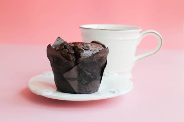 Muffin on Grey Napkin , Pastel Pink Background