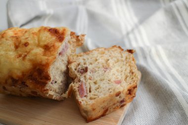 Tasty Ham and Cheese Bread on Grey Napkin
