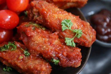 Chicken wings, Buffalo wings, on black background