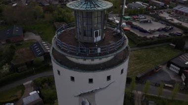 Hollanda, Zeeland 'in pitoresk manzarası arasında geçen Watertoren Oostburg' un çarpıcı mimarisini araştırın. Bu simgenin dingin güzelliğini ve tarihsel önemini tecrübe edin..