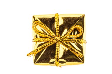 Gift box of gold color isolated on white background.