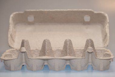 Empty paper carton box for eggs on white background, eco friendly or green product.