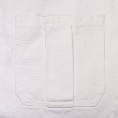 Close up of white jeans texture with pocket. Abstract denim cotton fabric.