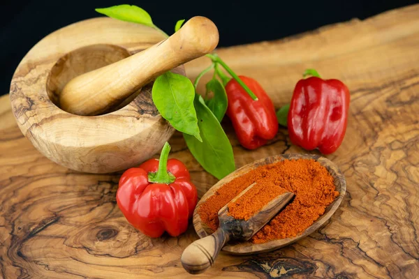 spicy pepper on olive wood