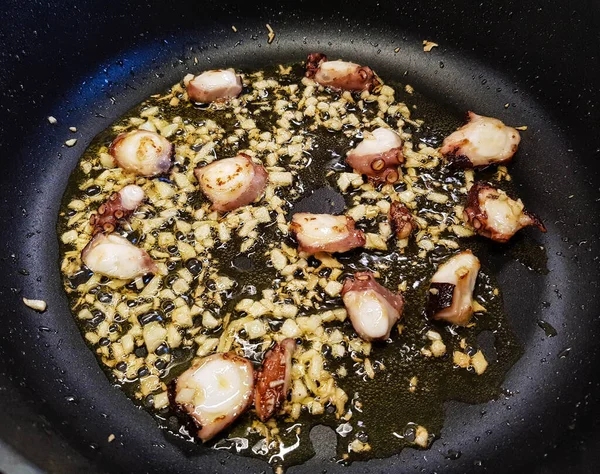 italian seafood pulpo and shells with pasta