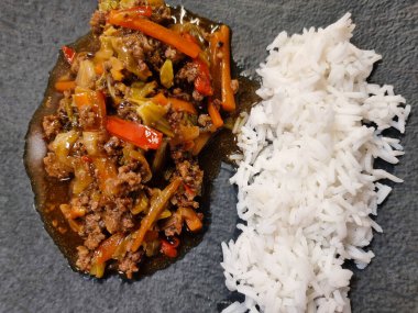 asian kitchen spicy curry with vegetables and rice